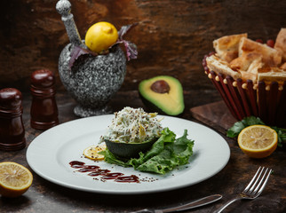mixed vegetable salad served with sea cabbage and mayonnaise