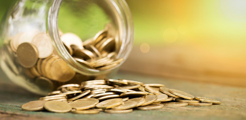 Financial freedom concept, web banner of gold money coins and jar, with blank, copy space