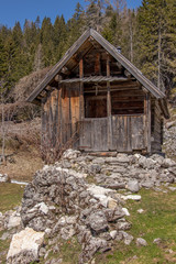 Old mountain hut in mountain pasture Vodicni vrh