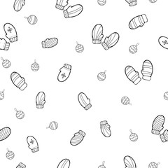 Winter seamless pattern on white background. Decorated cartoon gloves with Christmas balls.