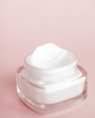 Face cream moisturizer jar on beige background, moisturizing skin care lotion and lifting emulsion, anti-age cosmetics for luxury beauty skincare brand