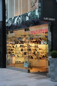 MANCHESTER, UK - APRIL 22, 2013: Kurt Geiger shoes store in Manchester, UK. Kurt Geiger is a British footwear brand. It has 70 stores.