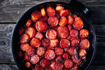 candied yams or sweet potatoes in  dish