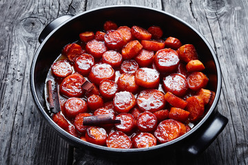 candied yams or sweet potatoes in dish