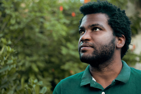 Black man looking up