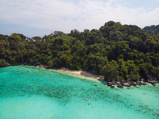 Fototapeta premium A diving trip in the crystal clear water in front of a lonely island in Southeast Asia