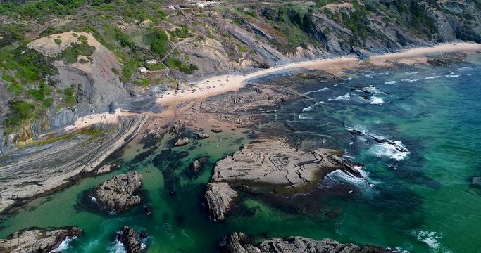 Aerial view of the Carreagem Beach and the rock formations at the in Aljezur, Algarve; 