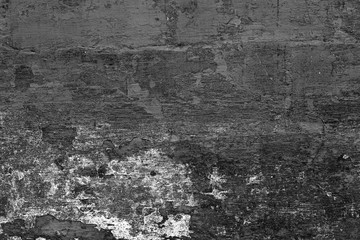 Texture of a brick wall with cracks and scratches which can be used as a background