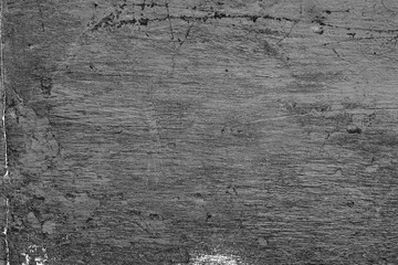 Texture of a concrete wall with cracks and scratches which can be used as a background
