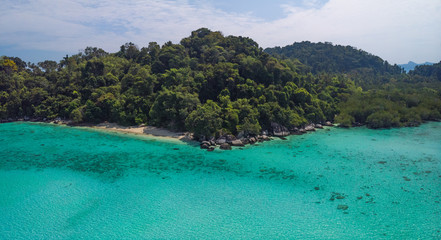 Fototapeta premium A diving trip in the crystal clear water in front of a lonely island in Southeast Asia