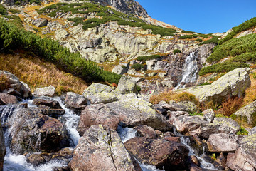 The Skok waterfall and creek at the yellow hiking trail in High Tatras National Park in Slovakia © andras_csontos