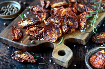 Sun-dried tomatoes on a wooden table