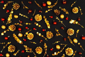 Christmas pattern of holiday decorations on dark background