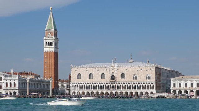 View from water taxi over Venetian Lagoon in front of Riva degli Schiavoni and Doge's Palace, Venice, Italy