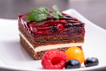 Cake with jelly, blueberries, raspberries