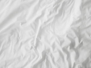 Soft white wrinkled fabric background