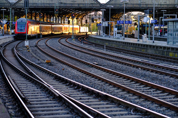 Train illuminated by the morning sun, morning atmosphere at Aachen Central Station