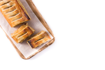 Traditional homemade apple strudel slice isolated on white background. Top view. Copy space