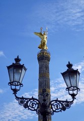 Fototapeta na wymiar lamppost on background of blue sky