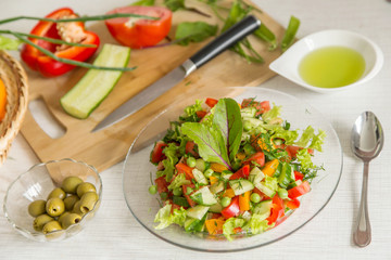 Fresh colorful vegetable salad in plate. Cooking healthy diet food