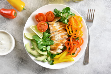 Vegetable salad with grilled chicken breast