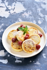 Cottage cheese pancakes with fresh raspberries