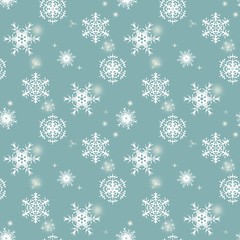 Seamless christmas pattern. White snowflakes on a blue background.