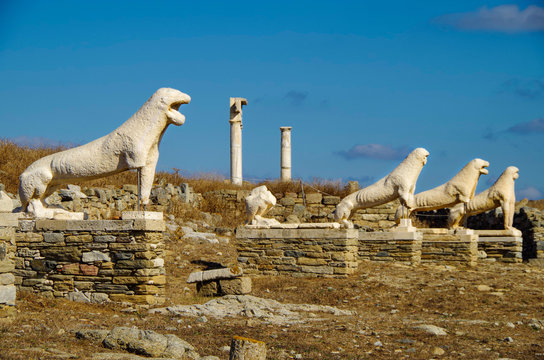 Ancient and historic temple ruins with columns and walls on archeologic site museum island Delos excavation site in Greece in the Aegean Sea with Apollon Sanctuary