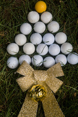 Christmas card simulating tree with golf balls