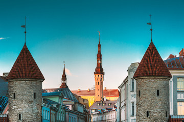 Fototapeta premium Tallinn, Estonia. Famous Landmarks Viru Gate And Town Hall On Background. Old Town. Popular Touristic Place. UESCO world heritage site