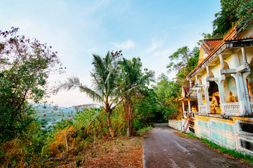 Obraz premium A bit abandoned buddhist temple near a road. Phuket, Thailand.
