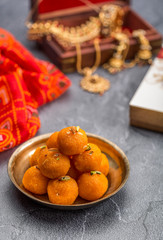 Motichoor Ladoo or Laddu - made from fine bundi, ball shaped sweets popular in indian subcontinent cooked with sugar, ghee or oil
