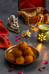 Motichoor Ladoo or Laddu - made from fine bundi, ball shaped sweets popular in indian subcontinent cooked with sugar, ghee or oil