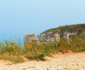 Normandy coast. High coast Etretat, France, blue sky