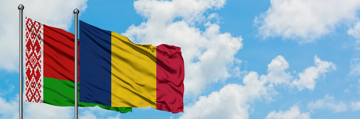 Belarus and Chad flag waving in the wind against white cloudy blue sky together. Diplomacy concept,...