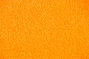 Elegant yellow leatherette background. Free space for text.