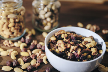 white bowl with varied organic dry fruits