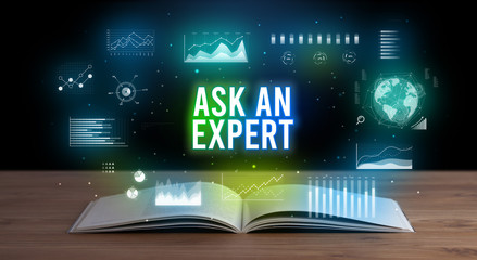 ASK AN EXPERT inscription coming out from an open book, creative business concept