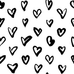 Thick grunge hand drawn hearts. Seamless pattern in black and white. Perfect for wrapping paper, textile, fabric and backdrops. Vector.