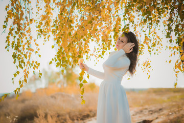 Autumn golden time, portrait of modest girl from next door, outdoors 