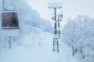 Fototapeta na wymiar Landscape and Mountain view of Nozawa Onsen in winter , Nagano, Japan.