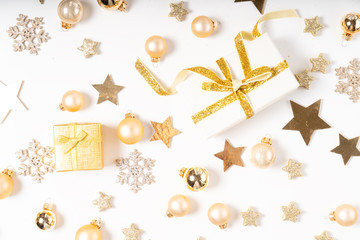 Fototapeta na wymiar Christmas flat lay scene with golden decorations