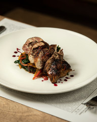 beef wrap served with roasted vegetables, spinach in teriyaki sauce