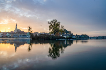Fototapeta premium autumn tree in the river inn 