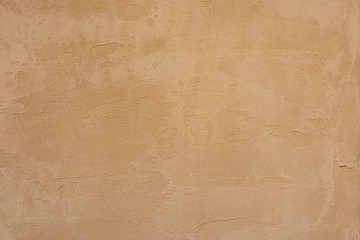 茶色い漆喰の壁