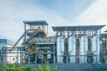 Close up Industrial view at oil refinery plant form industry zone with sunrise and cloudy sky