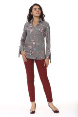 indian business woman executive posing in print formal official long sleeve blouse high heels stiletto shoes