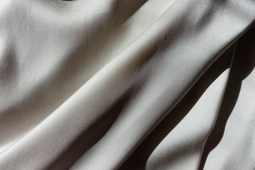 Delicate grey chiffon fabric in soft folds