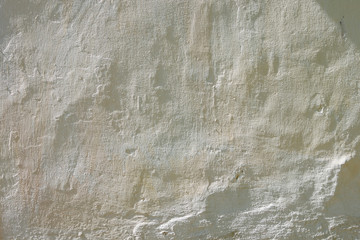 The texture of a plastered white wall. Close-up. Background