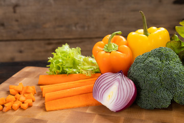 vegetables on a wooden cutting board